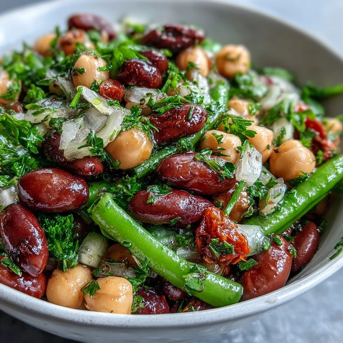 This colorful Three-Bean Salad photo shows a perfect potluck dish ready to serve.