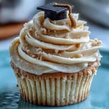 Decadent graduation cupcakes featuring handmade fondant caps, perfect for celebrating achievements.