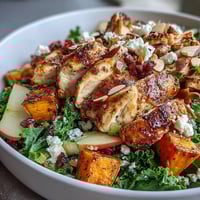 Fall Sweet Potato Harvest Bowl with roasted chicken, golden sweet potatoes, crisp apple slices, and creamy goat cheese for a cozy autumn meal.